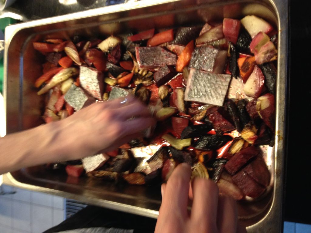 Getting beets, fennel, carrot and sea bream ready for a quick roast in the oven (photo credit: Jessica Steinberg/Times of Israel)