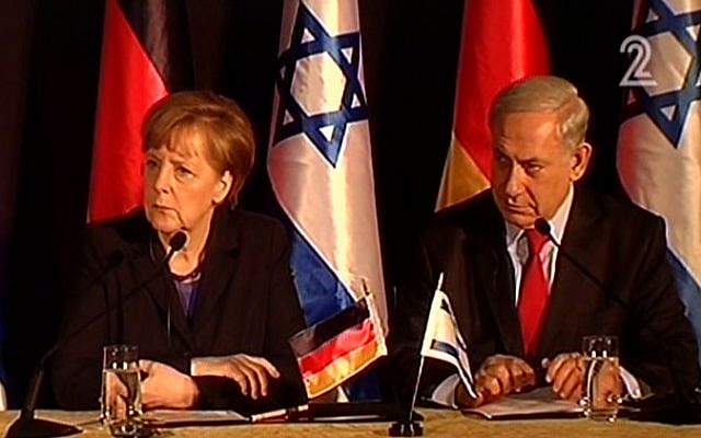 Angela Merkel, left, and Benjamin Netanyahu at a press conference in Jerusalem in February 2014. (screen capture: Channel 2) Angela Merkel, left, and Benjamin Netanyahu at a press conference in Jerusalem in February 2014. (screen capture: Channel 2)
