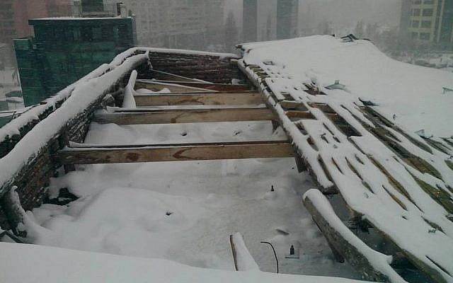 The roof of Bucharest's Jewish State Theater collapsed under the weight of snow on Jan. 25, 2014. (The Jewish State Theater of Bucharest/JTA)