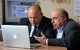 Minister of Diaspora Affairs Naftali Bennett (left) and Jewish Agency Chairman Natan Sharansky (right) join an 'online jam session' in Jerusalem, February 2014. (Sasson Tiram)