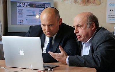 Minister of Diaspora Affairs Naftali Bennett (left) and Jewish Agency Chairman Natan Sharansky (right) join an 'online jam session' in Jerusalem, February 2014. (Sasson Tiram)