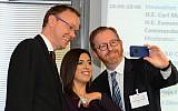 (L. to R.) Sweden's Ambassador to Israel Carl Magnus, Tzav 8 co-founder Yael Shany, and Ireland's Ambassador to Israel Eamonn McKee take a 'high-tech selfie' at the Tzav 8 event in Netanya. (photo credit: Courtesy)