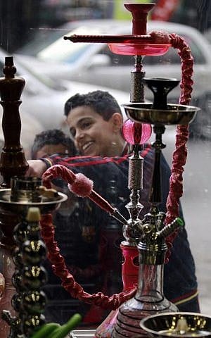 Traditional water pipes are displayed in a shop in the Jordanian capital Amman on January 28, 2014. (photo credit: AFP/Khalil Mazraawi)