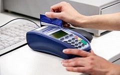 Illustration: Credit card in use.  via Shutterstock