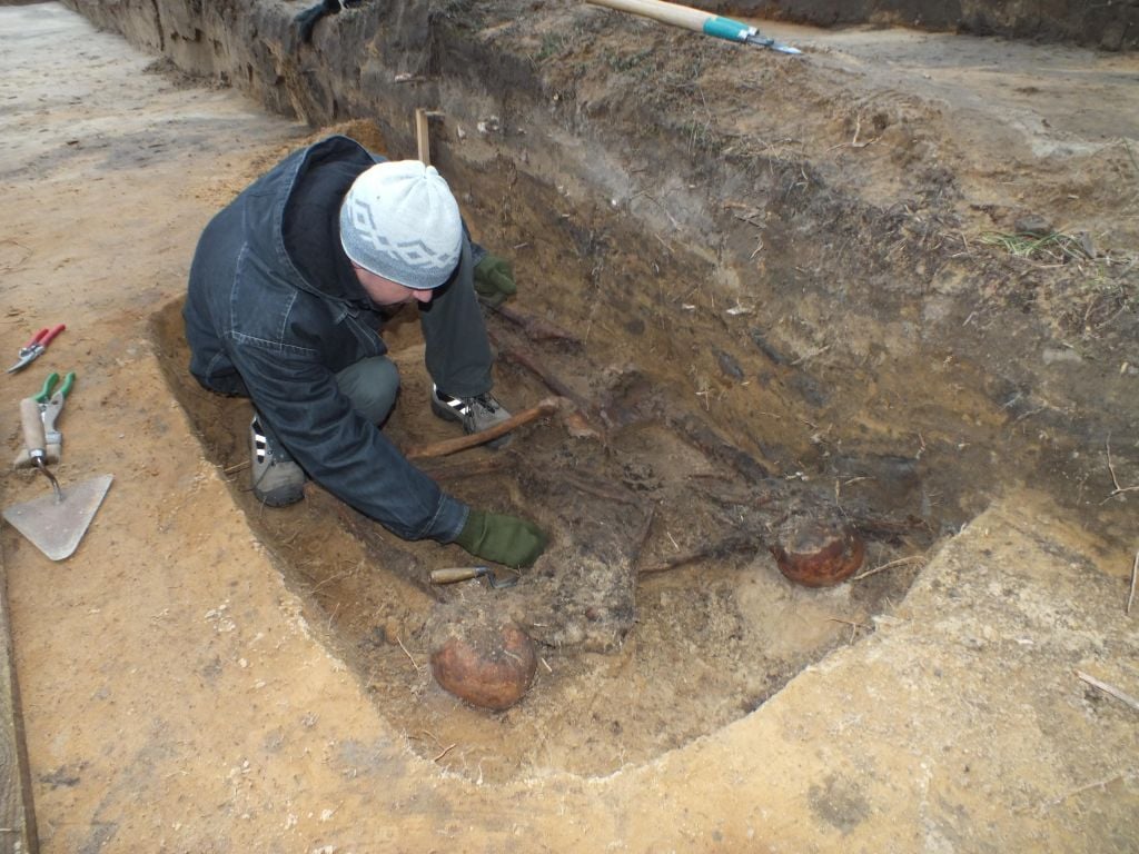 At Sobibor, an excavator unearths a skeleton toward the end of 2013 (photo courtesy: Wojtek Mazurek) At Sobibor, an excavator unearths a skeleton toward the end of 2013 (photo courtesy: Wojtek Mazurek)