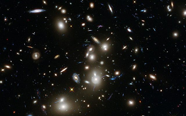 Image of the Abell 2744 galaxy cluster, taken by NASA's Hubble telescope on January 7, 2014. (photo credit: CC BY NASA) Image of the Abell 2744 galaxy cluster, taken by NASA's Hubble telescope on January 7, 2014. (photo credit: CC BY NASA)