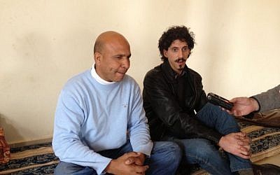 Abed Tarrabin, left, alongside a translator and employee of MediaCentral (photo credit: Mitch Ginsburg/ Times of Israel) Abed Tarrabin, left, alongside a translator and employee of MediaCentral (photo credit: Mitch Ginsburg/ Times of Israel)
