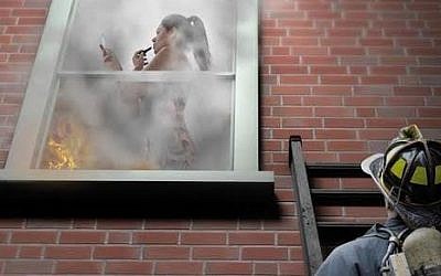 This ad from New-Pharm, featuring a women fixing her makeup while her house burns, made the list. (photo credit: Courtesy of WIZO)