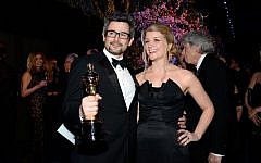 Sound editor Niv Adiri (L) attends the Oscars Governors Ball at Hollywood & Highland Center on Sunday, March 2, 2014 in Hollywood, California (photo credit: Kevork Djansezian/Getty Images/AFP)