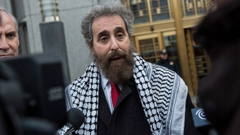 Stanley L. Cohen, a lawyer representing Osama Bin Laden's son-in-law, Sulaiman Abu Ghaith, speaks to reporters outside federal court in New York City on March 24, 2014 (photo credit: Andrew Burton/Getty Images/AFP)