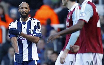 West Bromwich Albion's French striker Nicolas Anelka celebrates with a quenelle after scoring a goal, Dec. 28, 2013 (photo credit: AFP/Ian Kington) West Bromwich Albion's French striker Nicolas Anelka celebrates with a quenelle after scoring a goal, Dec. 28, 2013 (photo credit: AFP/Ian Kington)