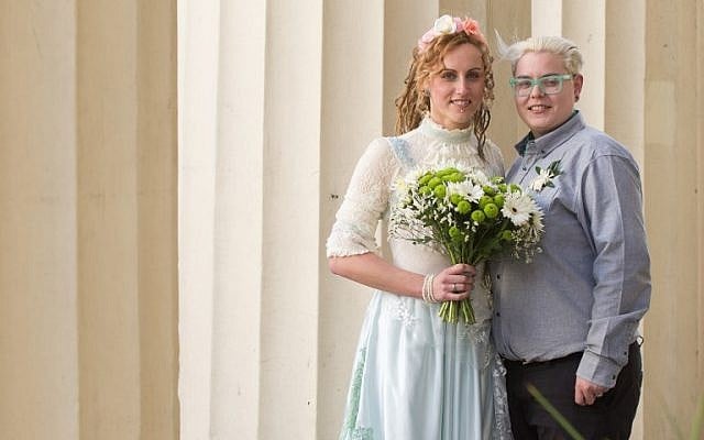 Nikki Pettit (L) and Tanya Ward (R) pose for photographs after their wedding ceremony in Brighton, southern England on Saturday, March 29, 2014 shortly after new gay marriage laws took effect. (photo credit: AFP/Leon Neal) Nikki Pettit (L) and Tanya Ward (R) pose for photographs after their wedding ceremony in Brighton, southern England on Saturday, March 29, 2014 shortly after new gay marriage laws took effect. (photo credit: AFP/Leon Neal)