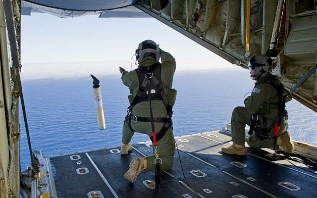 File photo: Royal Australian Air Force troops aboard a C-130J Hercules aircraft in the southern Indian Ocean participate in the multi-nation search for Malaysia Airlines flight MH370. (AFP/Australian Defense/Leading Seaman Justin Brown) File photo: Royal Australian Air Force troops aboard a C-130J Hercules aircraft in the southern Indian Ocean participate in the multi-nation search for Malaysia Airlines flight MH370. (AFP/Australian Defense/Leading Seaman Justin Brown)