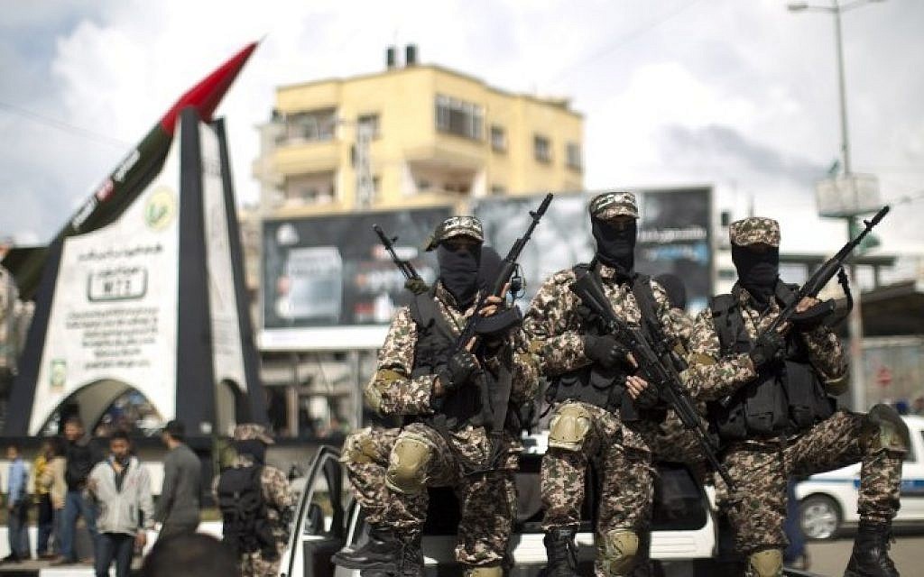 Hamas gunmen in Gaza City on March 10, 2014 (photo credit: AFP/Mahmoud Hams)