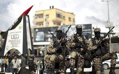 Hamas gunmen in Gaza City on March 10, 2014 (photo credit: AFP/Mahmoud Hams) Hamas gunmen in Gaza City on March 10, 2014 (photo credit: AFP/Mahmoud Hams)