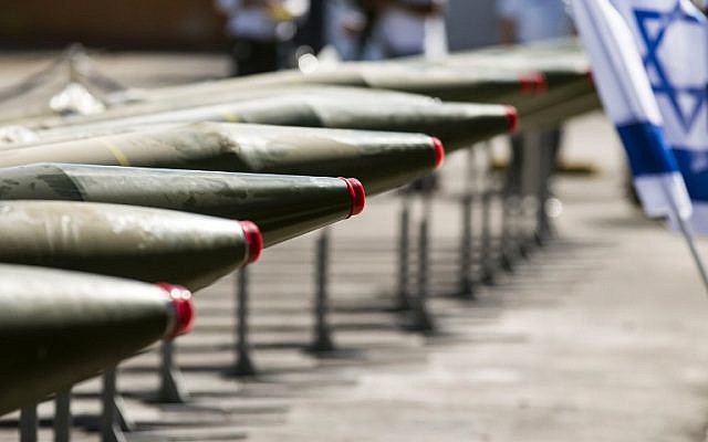 Some of the 40 rockets put on display by the IDF along the docks of the southern port of Eilat, Monday, March 10, 2014 (photo credit: AFP/Jack Guez) Some of the 40 rockets put on display by the IDF along the docks of the southern port of Eilat, Monday, March 10, 2014 (photo credit: AFP/Jack Guez)