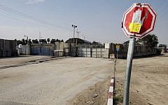 Illustrative: A general view shows the closed gates of the Kerem Shalom crossing between Israel and the southern Gaza Strip, Thursday, March 13, 2014 (photo credit: AFP/Said Khatib)