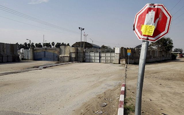 Illustrative: A general view shows the closed gates of the Kerem Shalom crossing between Israel and the southern Gaza Strip, Thursday, March 13, 2014 (photo credit: AFP/Said Khatib) Illustrative: A general view shows the closed gates of the Kerem Shalom crossing between Israel and the southern Gaza Strip, Thursday, March 13, 2014 (photo credit: AFP/Said Khatib)