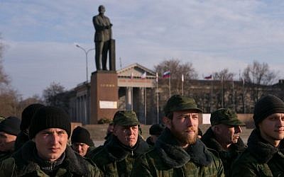 Pro-Russian volunteers gather at Lenin Square in Simferopol, Crimea, on March 14, 2014 (photo credit: AFP/Daniel Leal Olivas)