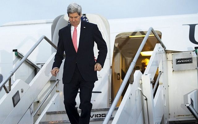 US Secretary of State John Kerry arrives in Rome on Tuesday, March 25, 2014. (photo credit: AFP/POOL/Jacquelyn Martin) US Secretary of State John Kerry arrives in Rome on Tuesday, March 25, 2014. (photo credit: AFP/POOL/Jacquelyn Martin)