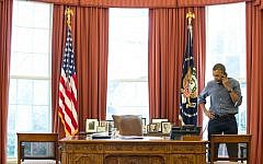 US President Barack Obama talks on the phone in the Oval Office with Russian President Vladimir Putin about the situation in Ukraine, Saturday, March 1, 2014 (photo credit: Pete Souza/White House/Flickr )