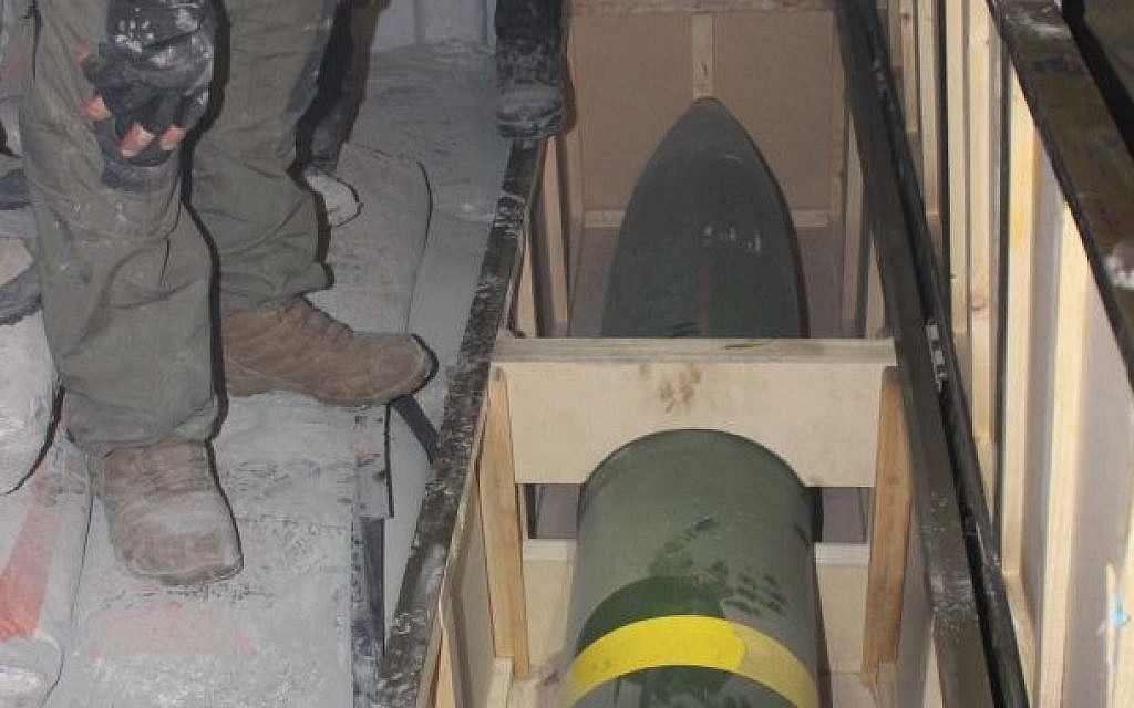 IDF soldiers inspect a missile found on board the Klos-C in a commando operation on Wednesday, March 5, 2014. The military said the ship was carrying an Iranian arms shipment headed for Gaza. (IDF)