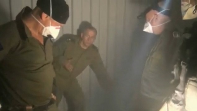 IDF Navy commander Maj. Gen. Ram Rothberg is seen on board the Klos-C as he inspects a cargo container carrying concealed Iranian weaponry, March 5, 2014 (Photo credit: IDF) IDF Navy commander Maj. Gen. Ram Rothberg, center, is seen on board the Klos-C as he inspects a cargo container carrying concealed Iranian weaponry, March 5, 2014 (Photo credit: IDF)