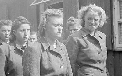 SS women camp guards are paraded for work in clearing the dead after the liberation of the Bergen-Belsen concentration camp, in Germany, April 1945 (photo credit: No 5 Army Film & Photographic UnitOakes, H (Sgt)/Wikimedia Commons)