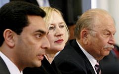 Ozdil Nami, left, pictured in Nicosia. (photo credit: AP Photo/Petros Karadjias)