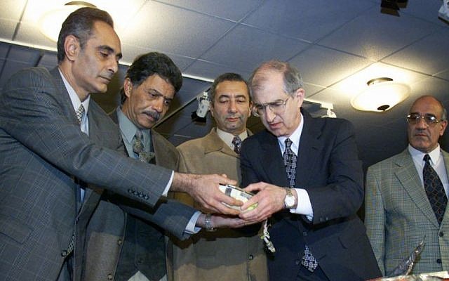 Egypt and US officials display the flight data recorder from EgyptAir Flight 990, Wednesday Nov. 10, 1999 at the National Transportation Safety Board in Washington. (photo credit: AP/Doug Mills)
