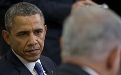 US President Barack Obama listens as Prime Minister Benjamin Netanyahu speaks at the Oval Office of the White House in Washington, DC, March 3, 2014. (photo credit: AP/Pablo Martinez Monsivais)