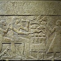 A Stela of Intef and Senettekh, is displayed as part of the exhibit "Soulful Creatures: Animal Mummies in Ancient Egypt," at the Orange County's Bowers Museum in Santa Ana, Calif. (photo credit: AP/Damian Dovarganes)