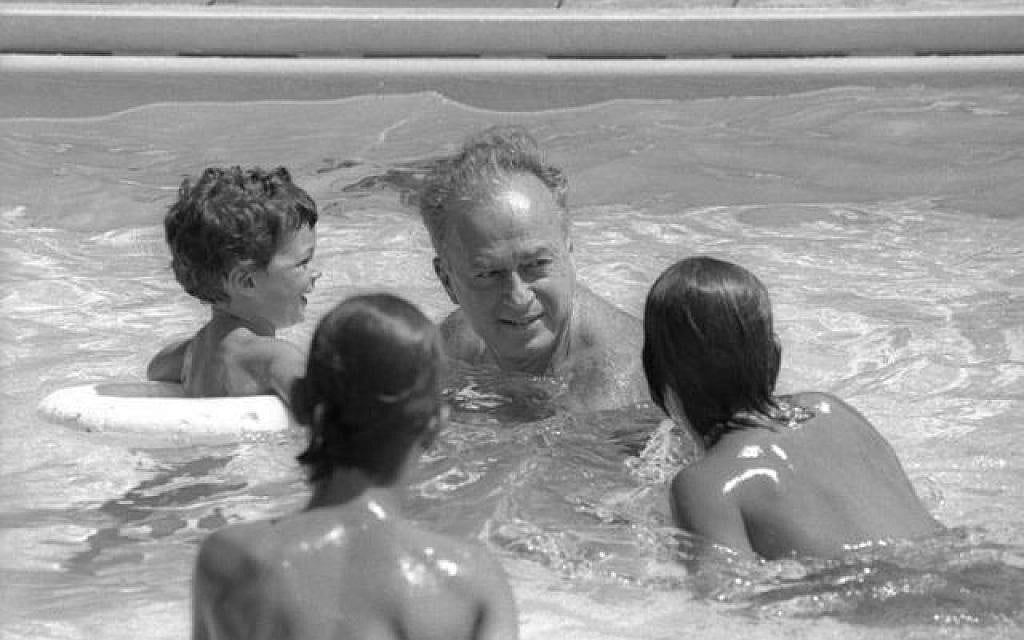 Yitzchak Rabin in the pool with his grandchildren (photo credit: GPO)