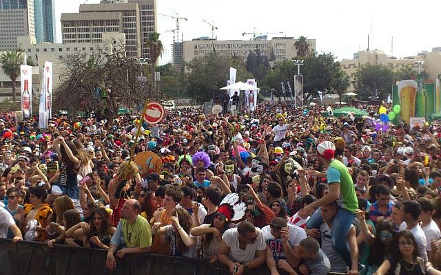Partying at Tel Aviv's annual Purim street party (Courtesy City of Tel Aviv)