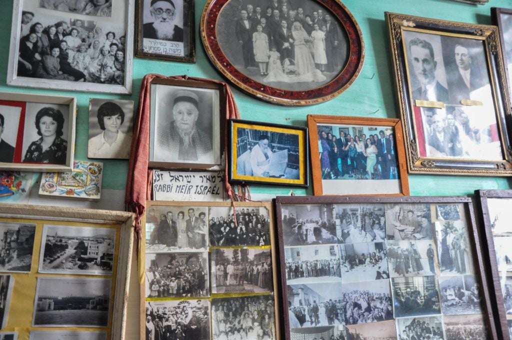 Old Jewish photos dot the walls in the Habarim museum in Fez. (photo credit: Michal Shmulovich)