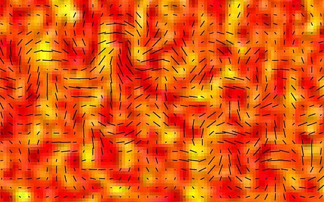 First moments: This image provided by the BICEP2 Collaboration shows slight temperature fluctuations, indicated by variations in color, of the cosmic microwave background of a small patch of sky and the orientation of its polarization, shown as short black lines. Researchers say since the cosmic microwave background is a form of light, it exhibits all the properties of light, including polarization. The changes in a particular type of polarization, indicated here, are theorized to be caused by gravitational waves. These waves are signals of an extremely rapid inflation of the universe in its first moments. (photo credit: AP Photo/BICEP2 Collaboration)