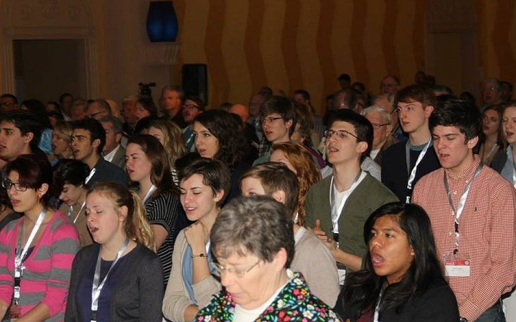 Young evangelicals pray at the Christ at the Checkpoint conference, March 12, 2014 (photo credit: courtesy/Bethlehem Bible College) Young evangelicals pray at the Christ at the Checkpoint conference, March 12, 2014 (photo credit: courtesy/Bethlehem Bible College)