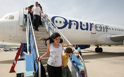 Israelis get off a plane at the airport in the Turkish resort of Bodrum, April 28, 2008 (Photo credit: Nati Shohat/Flash90)