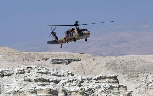 An IAF Sikorsky Blackhawk helicopter comes in for a landing in the Judean Desert, file photo (Kobi Gideon/Flash90) An IAF Sikorsky Blackhawk helicopter comes in for a landing in the Judean Desert, file photo (Kobi Gideon/Flash90)