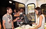 Israelis shop at the Cofix café chain in Tel on September 30, 2013, (Photo by Gideon Markowicz/Flash90)