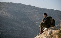Illustrative photo of an IDF soldier in the Jordan Valley, January 2, 2014. (Uri Lenz/Flash90)
