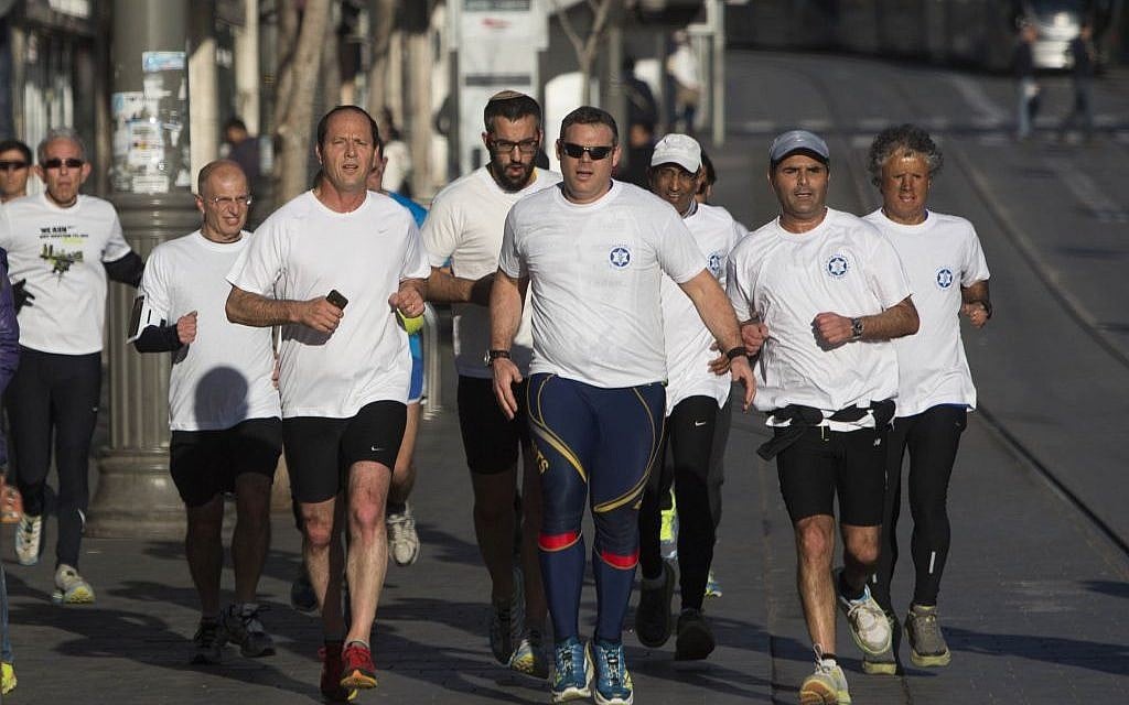 Jerusalem Mayor Nir Barkat, a longtime runner, preparing for the 2014 Jerusalem marathon (photo credit: Yonatan Sindel/Flash 90) Jerusalem Mayor Nir Barkat, a longtime runner, preparing for the 2014 Jerusalem marathon (photo credit: Yonatan Sindel/Flash 90)