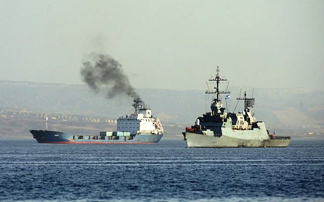 An Israeli Navy boat escorts the cargo vessel Klos C (left) into the Israeli port of Eilat on Saturday (Photo credit: Flash90) An Israeli Navy boat escorts the cargo vessel Klos C (left) into the Israeli port of Eilat on Saturday (Photo credit: Flash90)