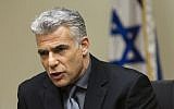 Minister of Finance and Chairman of Yesh Atid party, Yair Lapid, seen during the Yesh Atid Faction meeting at the Knesset on Monday, March 10, 2014. (photo credit: Flash90)