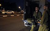 IDF soldiers in the southern city of Sderot on Wednesday night, March 12, 2014 (Photo credit: Flash90)