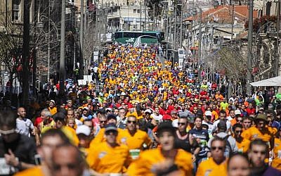 Runners during the 2014 marathon in Jerusalem. (photo credit: Uri Lenz/ Flash90)