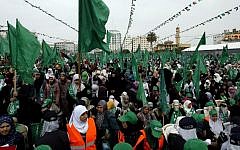 Tens of thousands of Hamas supporters during a rally to commemorate the 10-year anniversary of the assassination of the group's spiritual leader Sheik Ahmed Yassin in an Israeli airstrike a decade ago, in Gaza City, Sunday, March 23, 2014. (photo credit: Abed Rahim Khatib/Flash90)