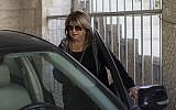 Shula Zaken, former bureau chief of ex-prime minister Ehud Olmert, leaving her home in Jerusalem on March 27, 2014. (photo credit: Yonatan Sindel/Flash90)