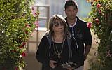 Shula Zaken, Ehud Olmert's bureau chief, leaves her home in Jerusalem on March 27, 2014. (photo credit: Yonatan Sindel/Flash90)