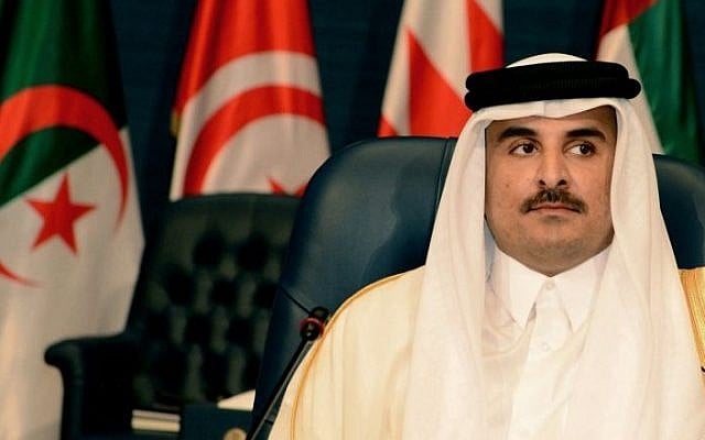 Emir of Qatar Sheikh Hamad bin Khalifa al-Thani at the opening session of the Arab League Summit in Bayan Palace, Kuwait City, on March 25, 2014. (photo credit: AP/Nasser Waggi) Emir of Qatar Sheikh Hamad bin Khalifa al-Thani at the opening session of the Arab League Summit in Bayan Palace, Kuwait City, on March 25, 2014. (photo credit: AP/Nasser Waggi)